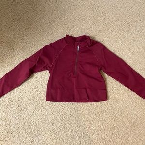 long sleeved red work out activewear crop top